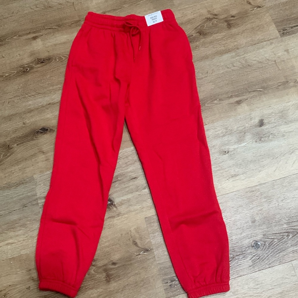 Women’s high rise red joggers from Charlotte Russe